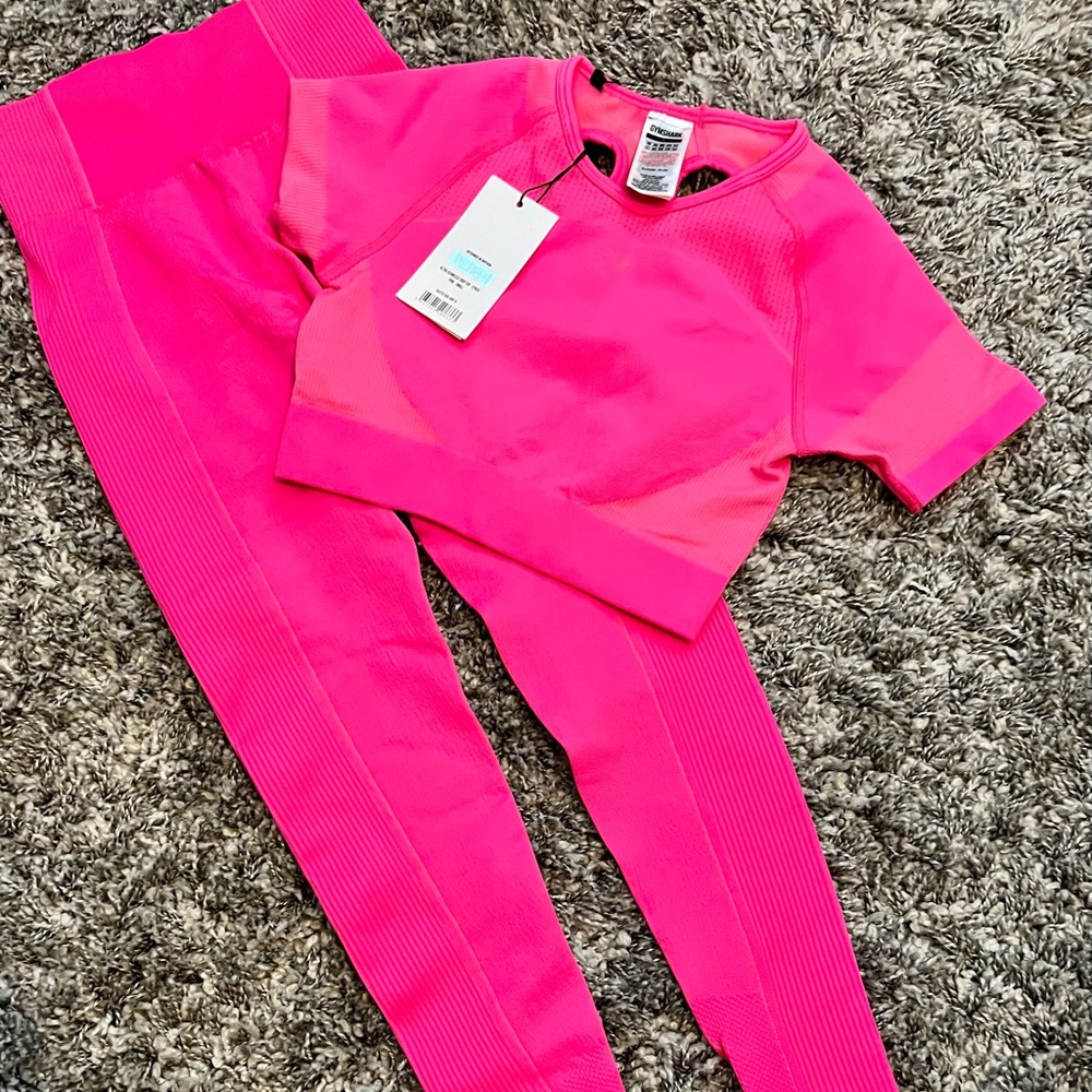 Brand new pop of pink Gymshark crop top and high waisted leggings.
